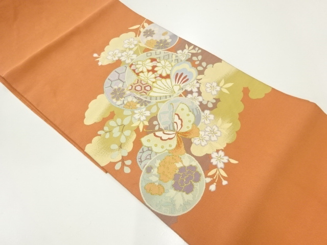 綴れ蝶に草花模様織出し名古屋帯